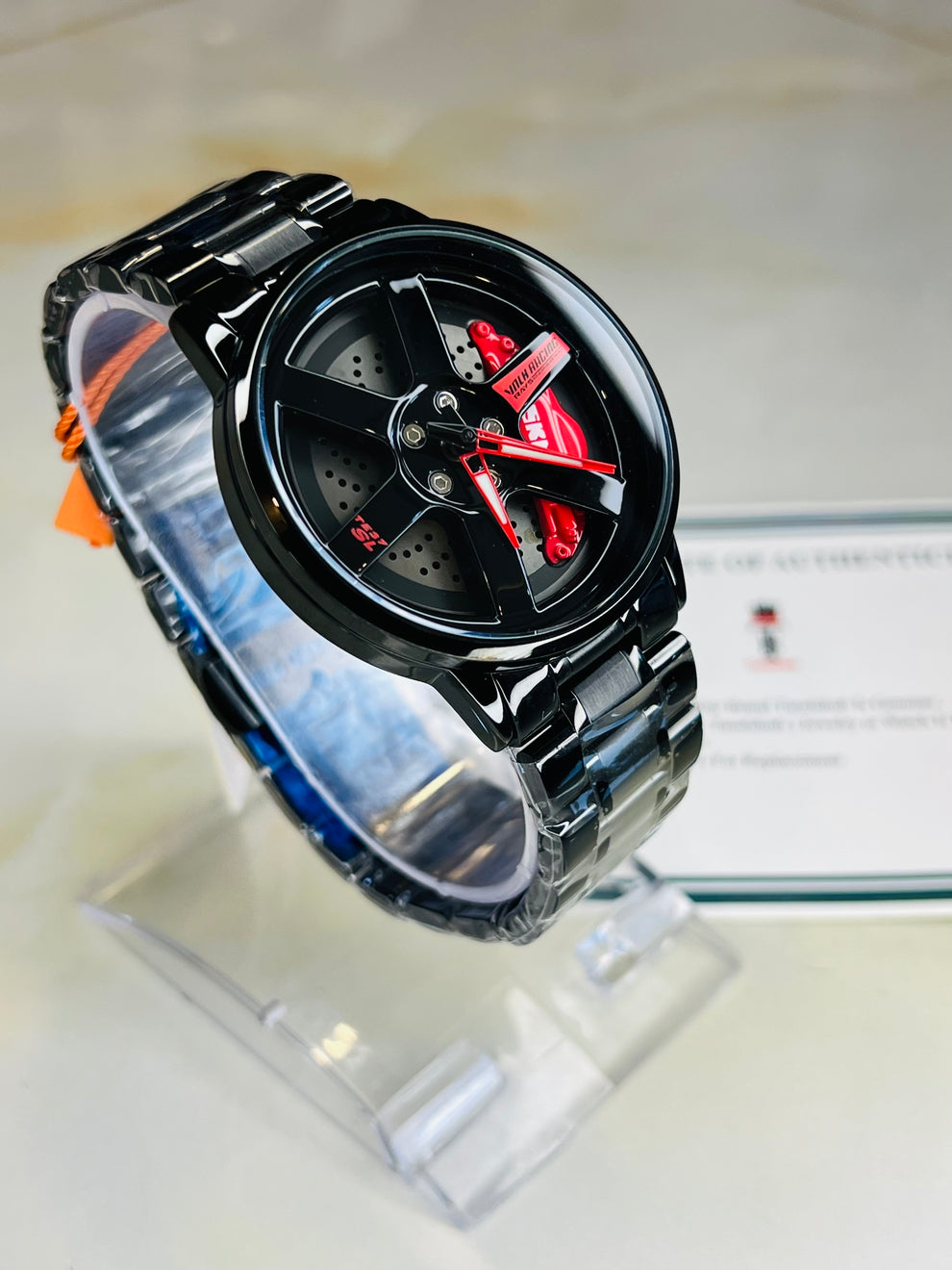 Skmei Wheel Watch – Spinner Wheel Design, Red Brake Cover, Black Titanium Case, 39mm Dial, PVD Vacuum Plated | 6-Month Machine Warranty